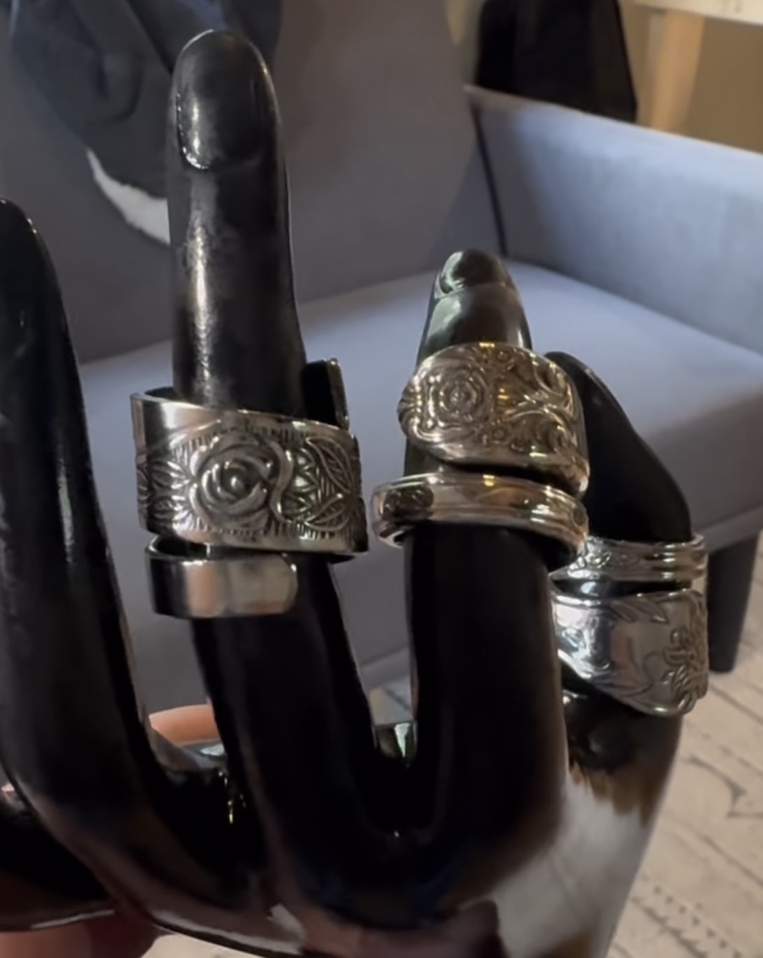 Collection of rings on display hand