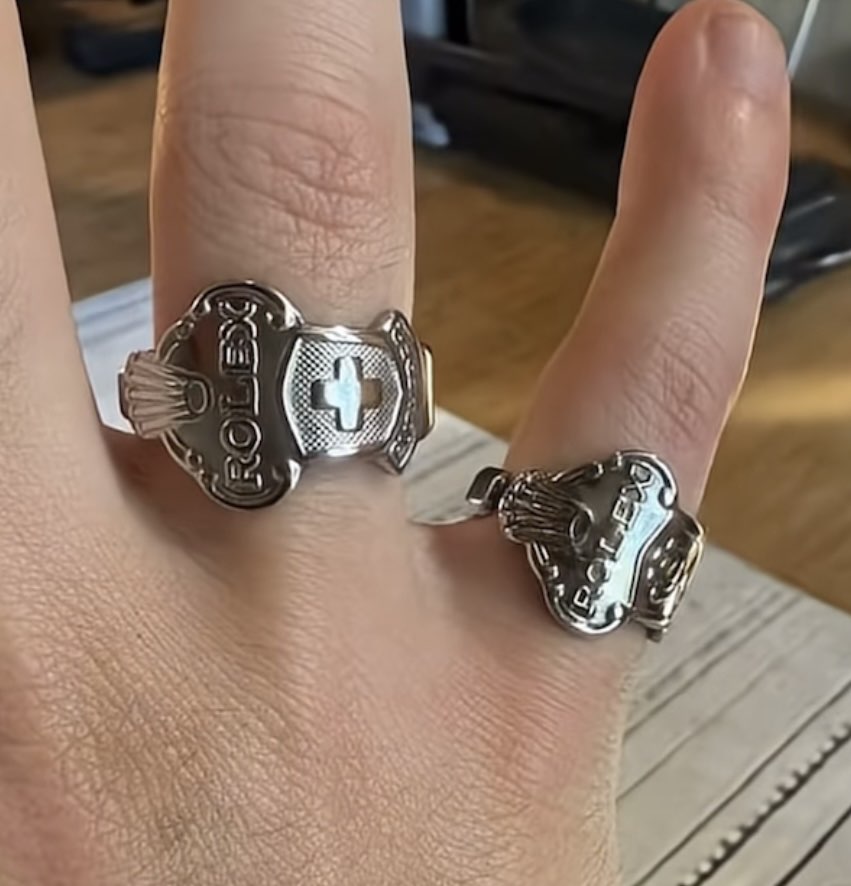 Two decorative rings on hand